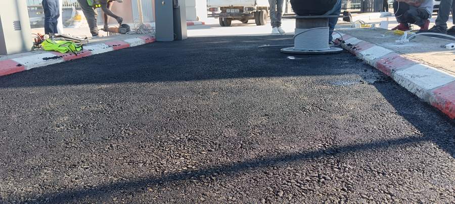 Close-up of freshly laid hot asphalt